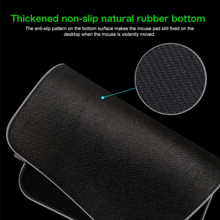 Computer Monster Pattern Illuminated Mouse Pad with vibrant colors and non-slip rubber base, ideal for gaming.