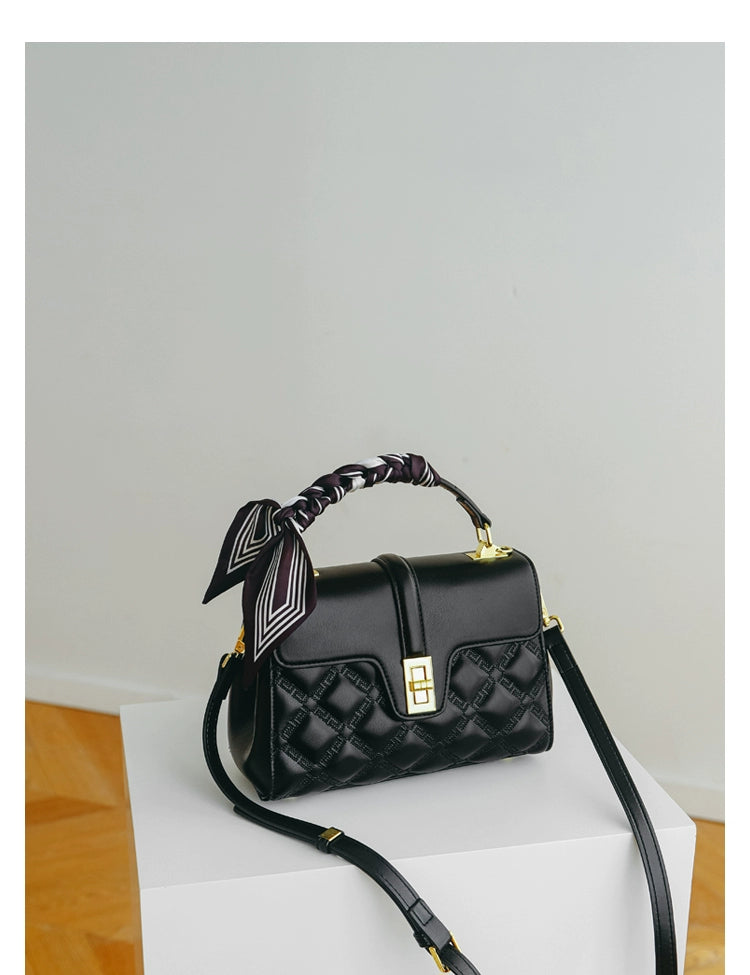 A stylish Commuter Women's Bag in a minimalist design, showcasing its large capacity and crossbody functionality, perfect for moms on the go.