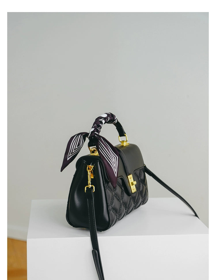 A stylish Commuter Women's Bag in a minimalist design, showcasing its large capacity and crossbody functionality, perfect for moms on the go.