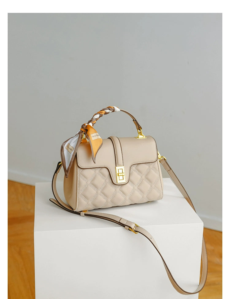 A stylish Commuter Women's Bag in a minimalist design, showcasing its large capacity and crossbody functionality, perfect for moms on the go.