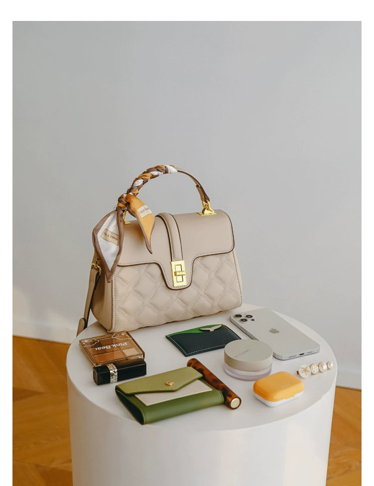 A stylish Commuter Women's Bag in a minimalist design, showcasing its large capacity and crossbody functionality, perfect for moms on the go.