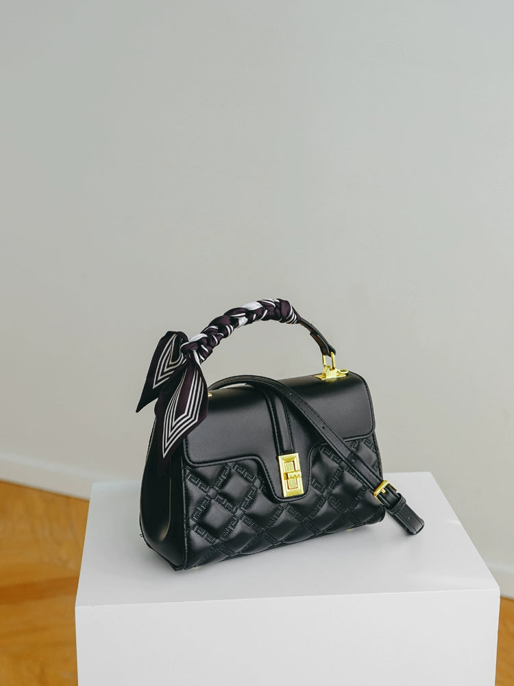 A stylish Commuter Women's Bag in a minimalist design, showcasing its large capacity and crossbody functionality, perfect for moms on the go.