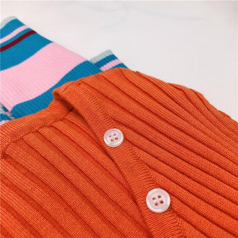 A stylish Contrast Color Stitching Irregular Thin Section Knitted Stretch Cardigan for women, featuring a unique patchwork design and V-neck collar.