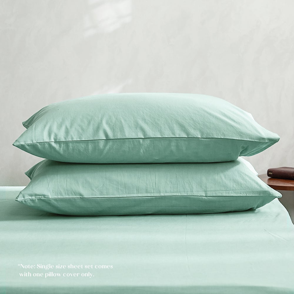 Cosy Club Duvet Cover Quilt Set in Essential Green, featuring soft washed cotton fabric and elegant textured design.