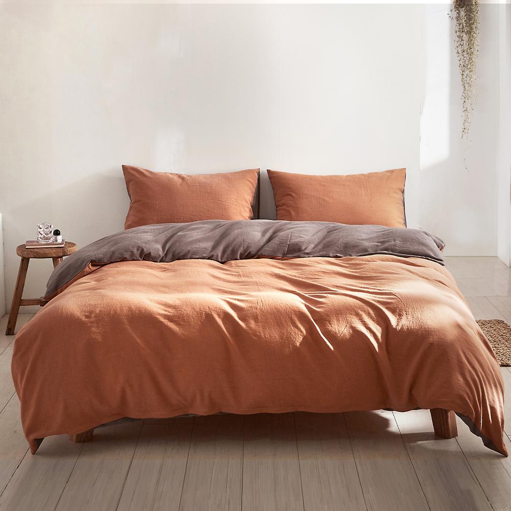 Cosy Club Quilt Cover Set in earthy pumpkin color, showcasing soft texture and two-tone design, perfect for king-sized beds.