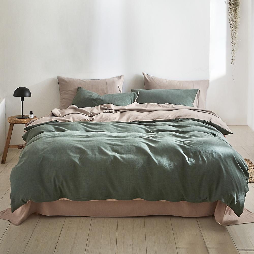 Cosy Club Quilt Cover Set in green beige, showcasing soft washed cotton fabric with a stylish two-tone design.