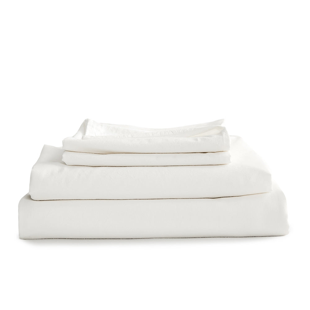Cosy Club Sheet Set featuring white double flat cover and pillow cases made from 100% washed cotton, showcasing softness and comfort.