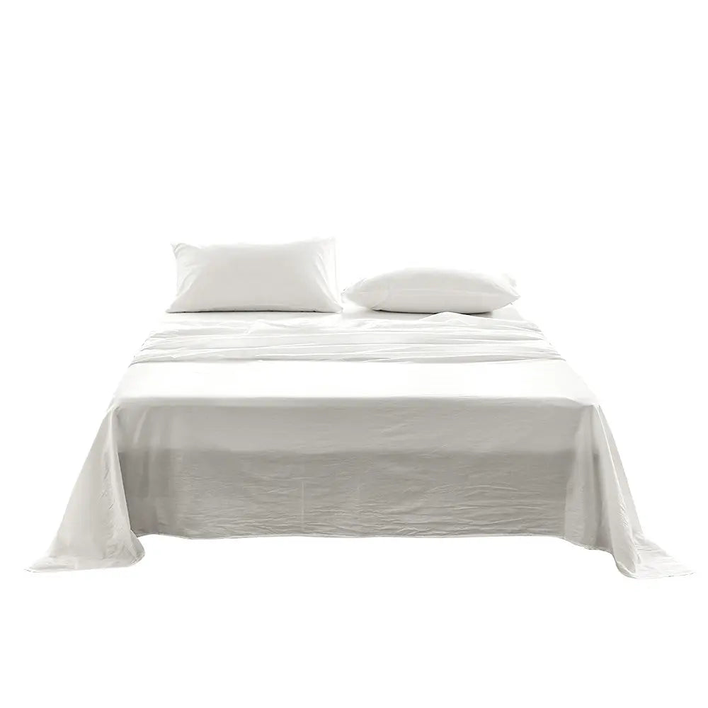 Cosy Club King Sheet Set in white, made from 100% washed cotton, featuring a flat sheet, fitted sheet, and pillow case, showcasing softness and comfort.