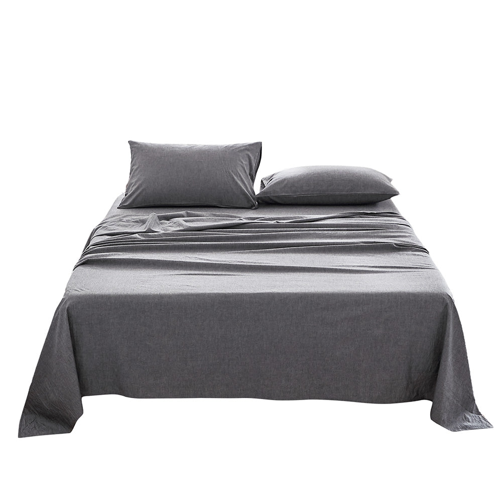 Cosy Club Queen Sheet Set in black, featuring a flat sheet, fitted sheet, and two pillowcases made from 100% washed cotton, showcasing a soft and breathable texture.