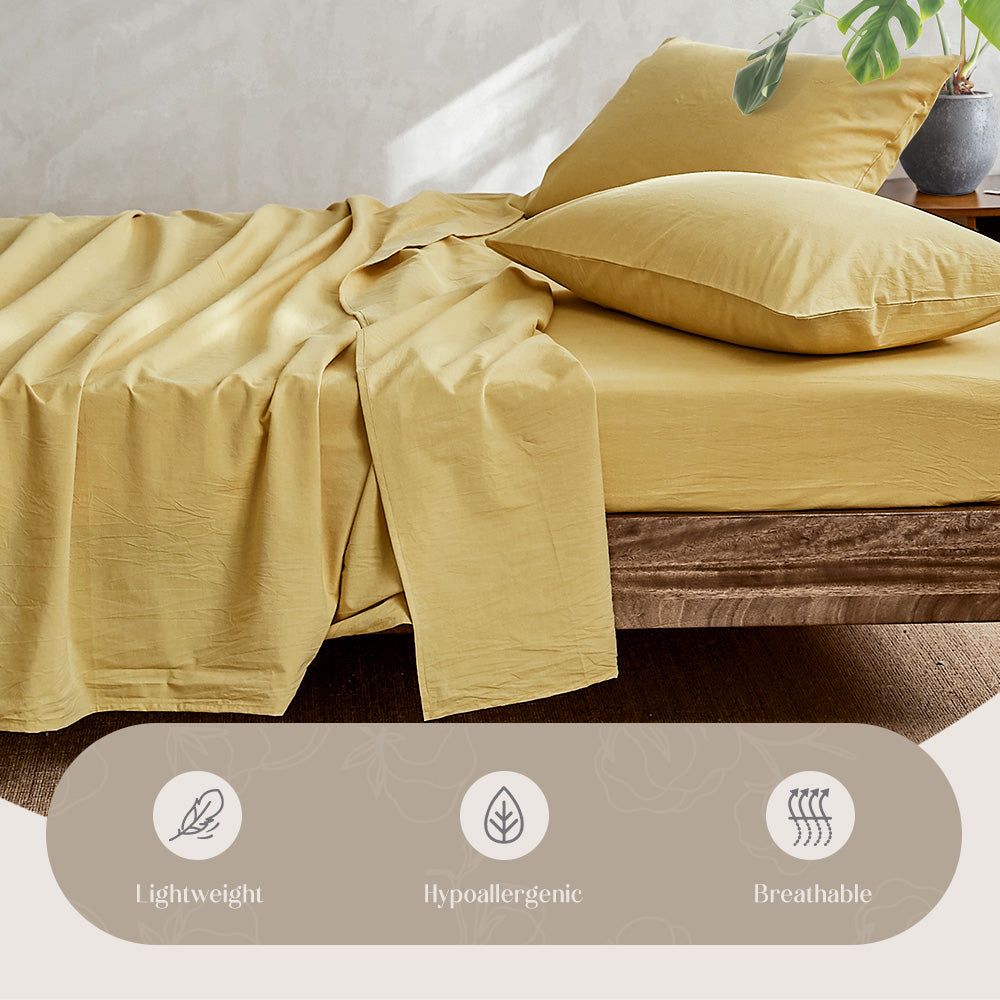 Cosy Club Sheet Set in yellow, featuring a flat sheet, fitted sheet, and pillow cases made from soft washed cotton.