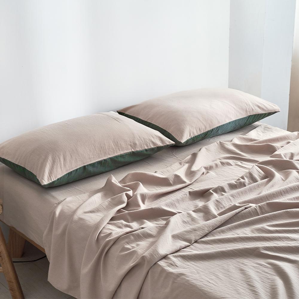 Cosy Club Double Green Beige Cotton Sheet Set featuring a soft texture and two-tone design, perfect for enhancing bedroom decor.