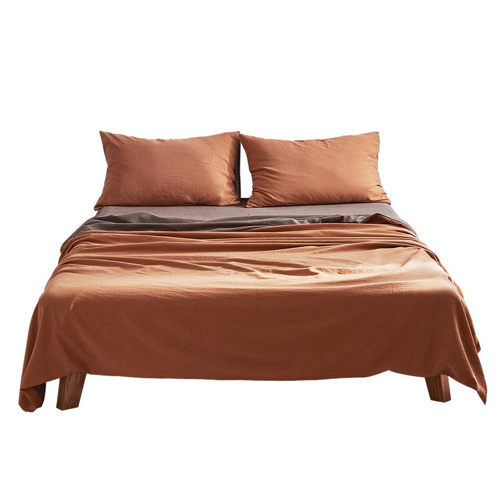 Cosy Club Cotton Sheet Set in orange brown, featuring a soft texture and two-tone design, perfect for a cozy bedroom.