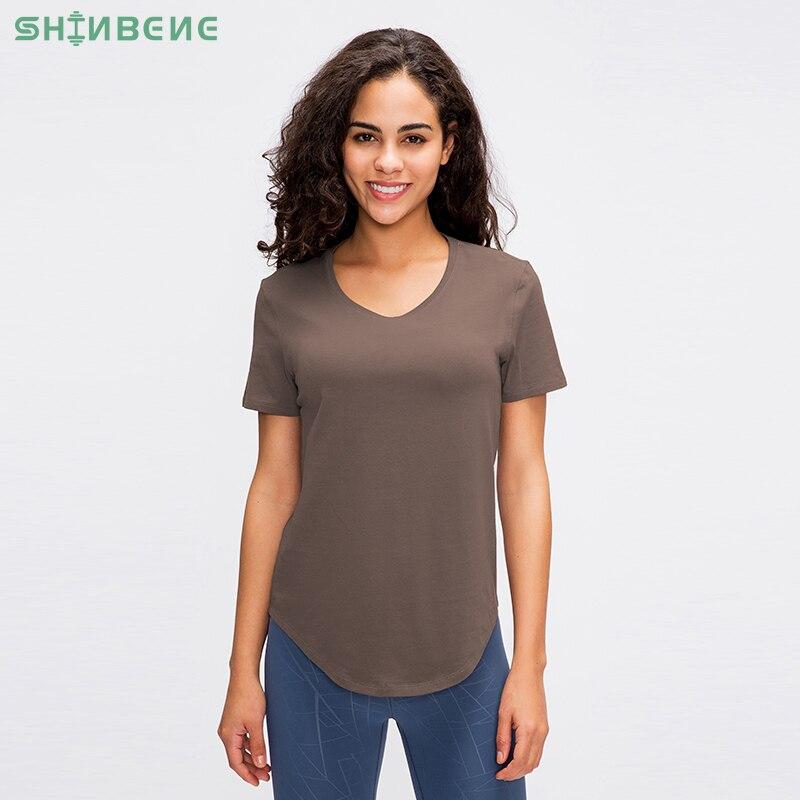 A stylish Cotton Yoga Exercise Workout T-shirt for women, featuring short sleeves and a hip-length design, perfect for workouts and casual wear.