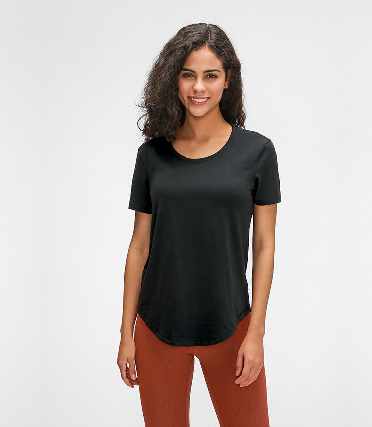 A stylish Cotton Yoga Exercise Workout T-shirt for women, featuring short sleeves and a hip-length design, perfect for workouts and casual wear.