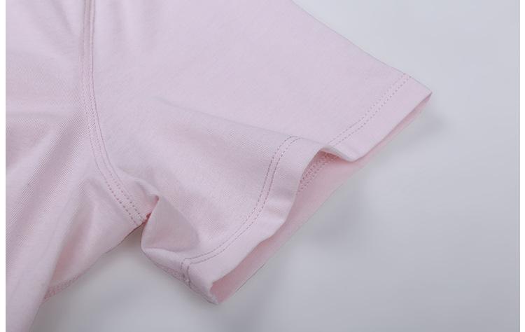 A stylish Cotton Yoga Exercise Workout T-shirt for women, featuring short sleeves and a hip-length design, perfect for workouts and casual wear.