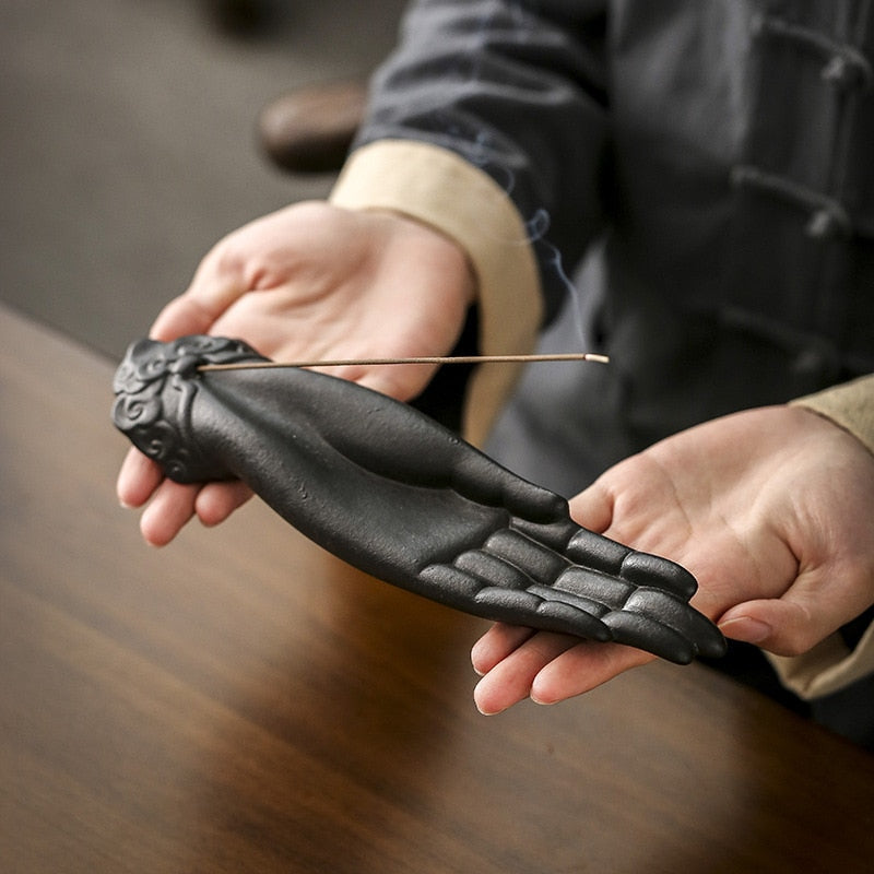 Creative Ceramic Buddha Hand Shape Aromatic Censer, showcasing intricate design and calming aesthetic for home decor.