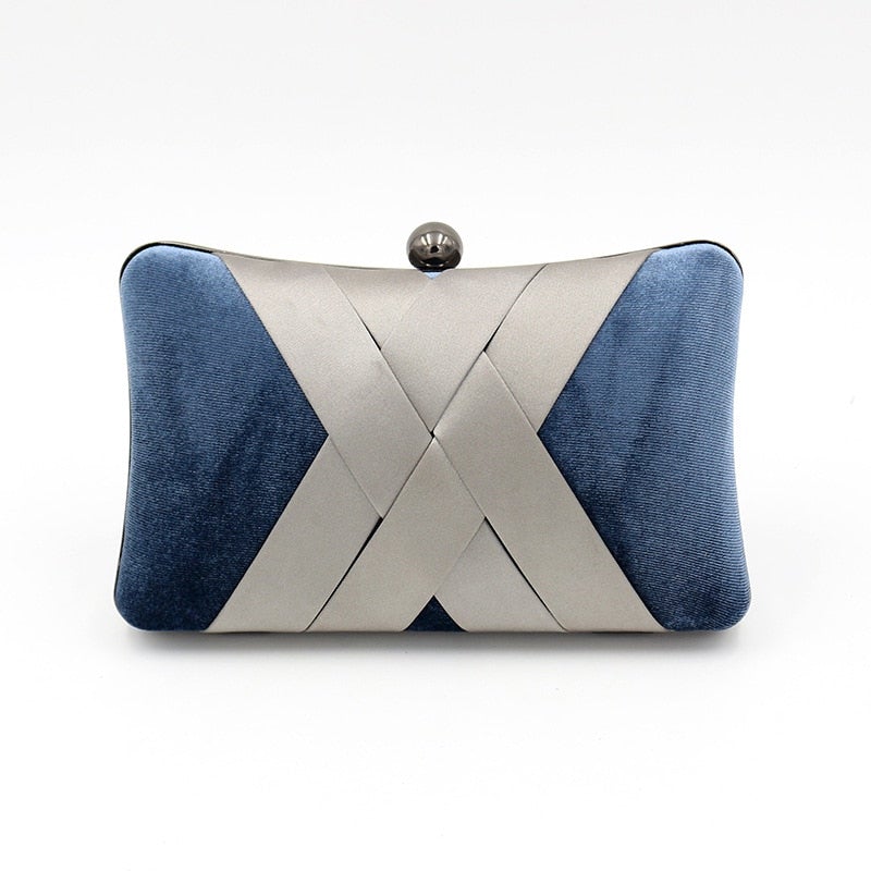 Criss Cross Satin Evening Bag in Velvet Blue, featuring a stylish pillow design and criss-cross decoration, perfect for parties and special occasions.