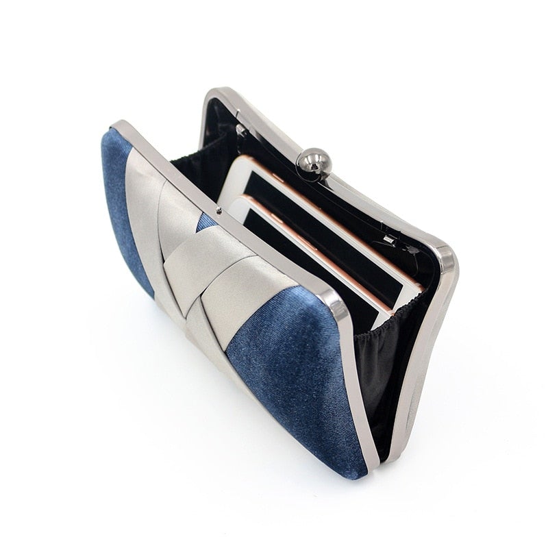 Criss Cross Satin Evening Bag in Velvet Blue, featuring a stylish pillow design and criss-cross decoration, perfect for parties and special occasions.