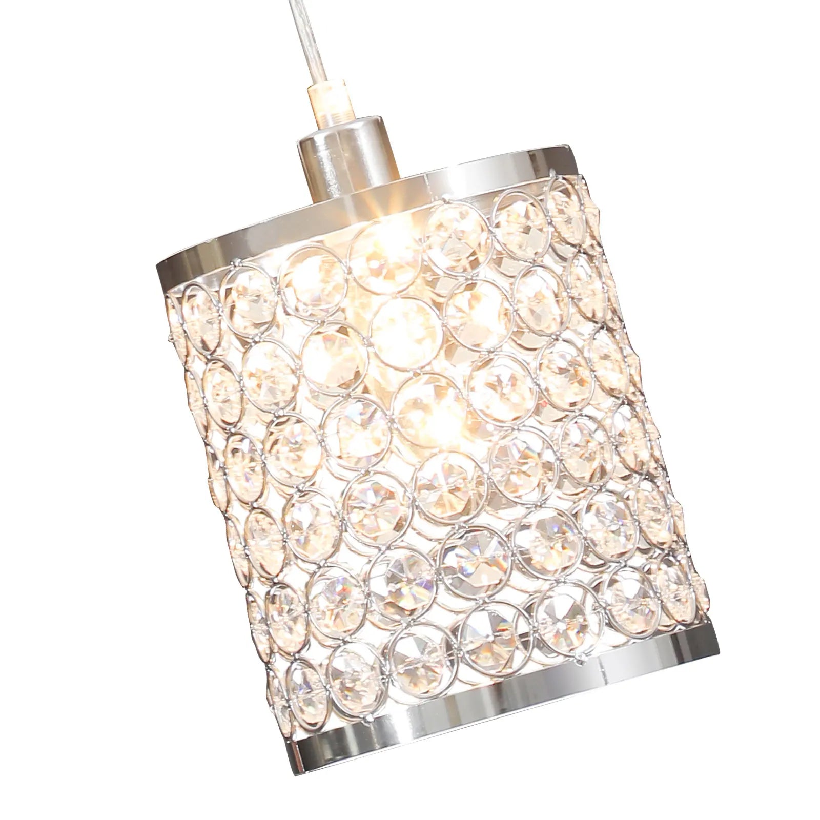 Elegant crystal pendant light with adjustable cord, perfect for modern kitchen islands.