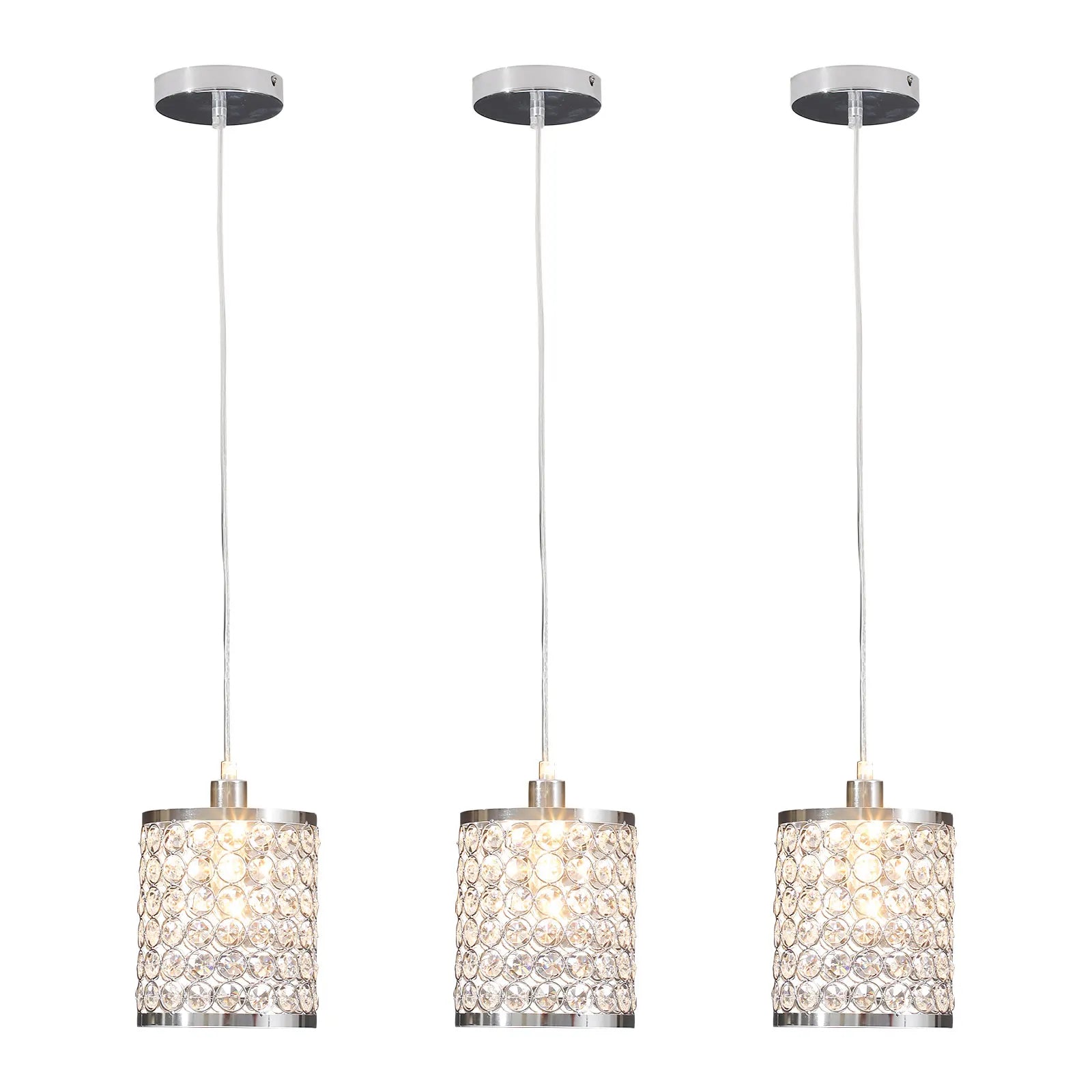 Elegant crystal pendant light with adjustable cord, perfect for modern kitchen islands.