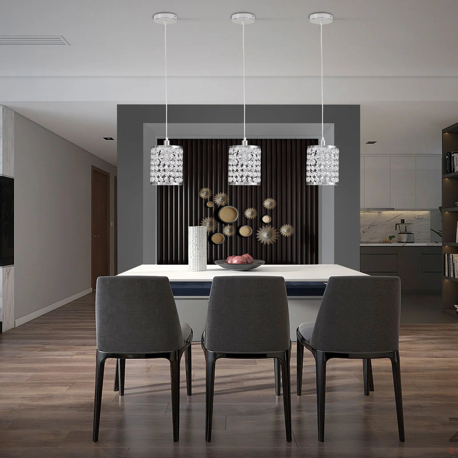Elegant crystal pendant light with adjustable cord, perfect for modern kitchen islands.