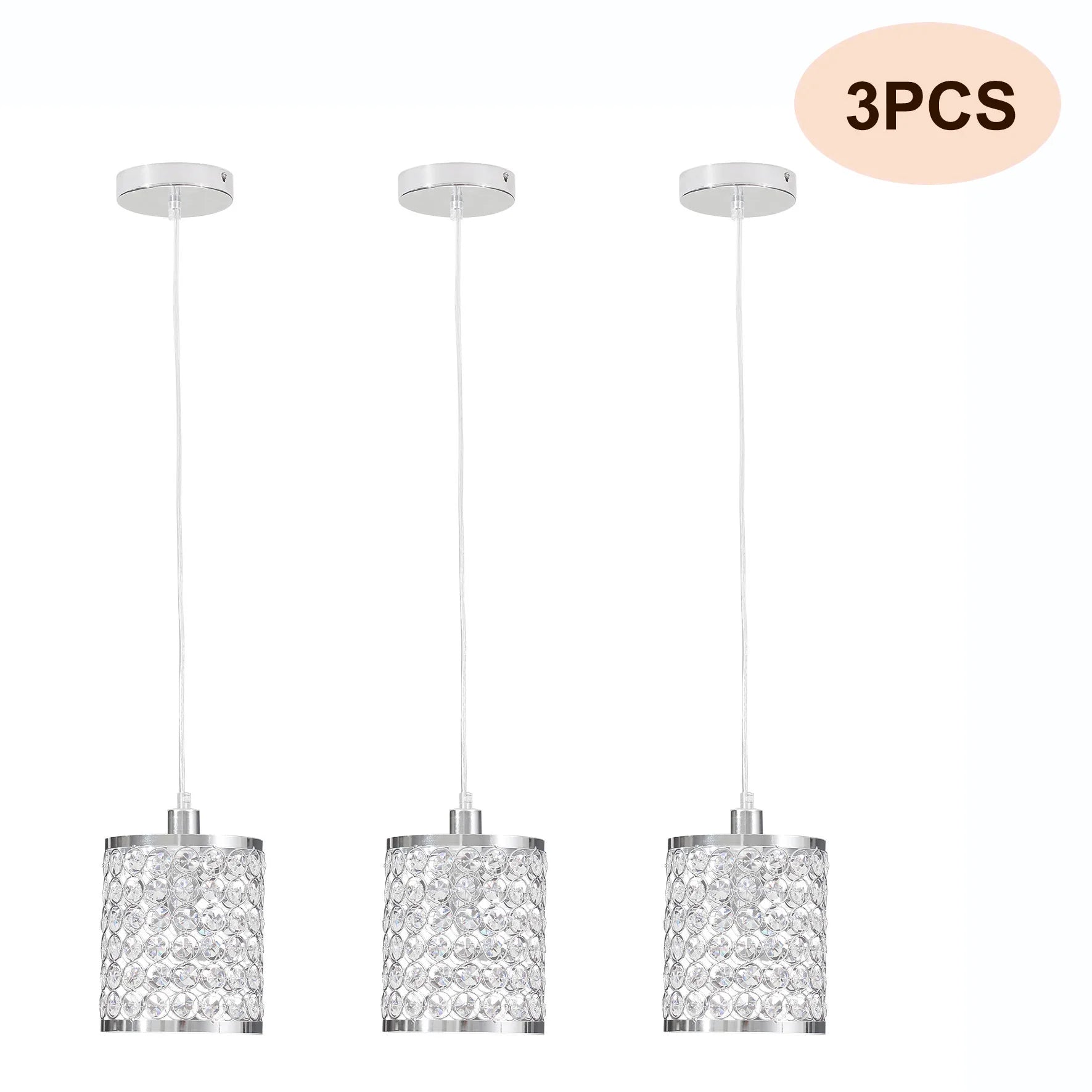 Elegant crystal pendant light with adjustable cord, perfect for modern kitchen islands.