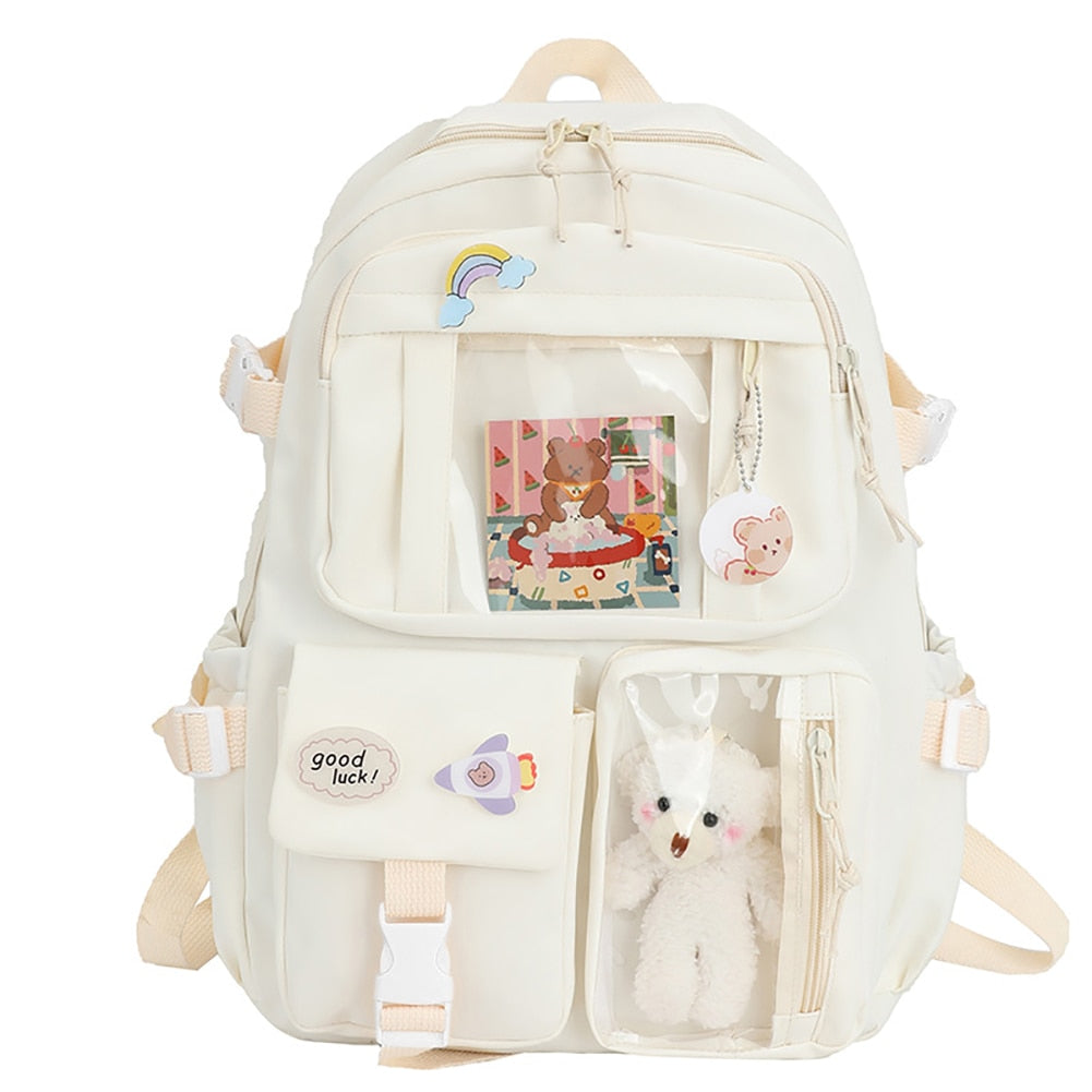 Cute waterproof nylon backpack for women with multiple pockets and soft handle, perfect for school and daily use.
