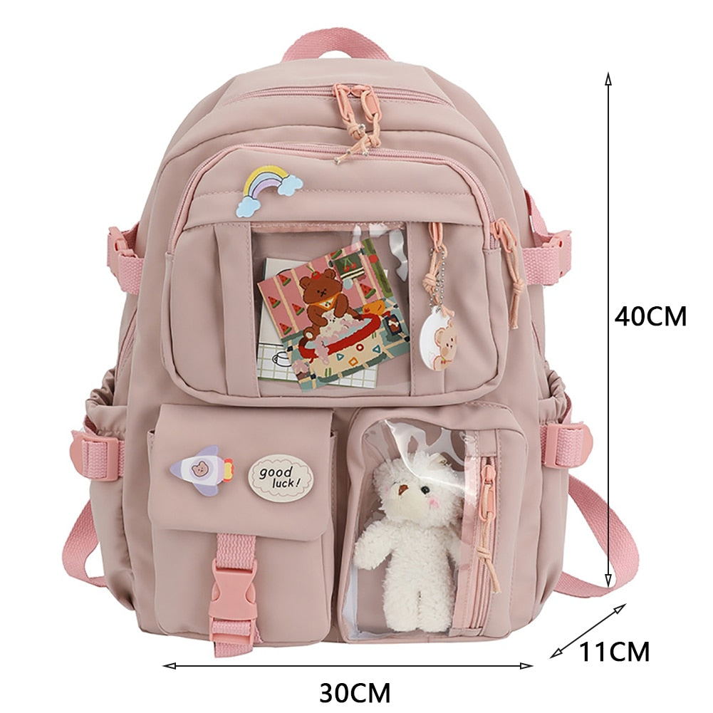 Cute waterproof nylon backpack for women with multiple pockets and soft handle, perfect for school and daily use.