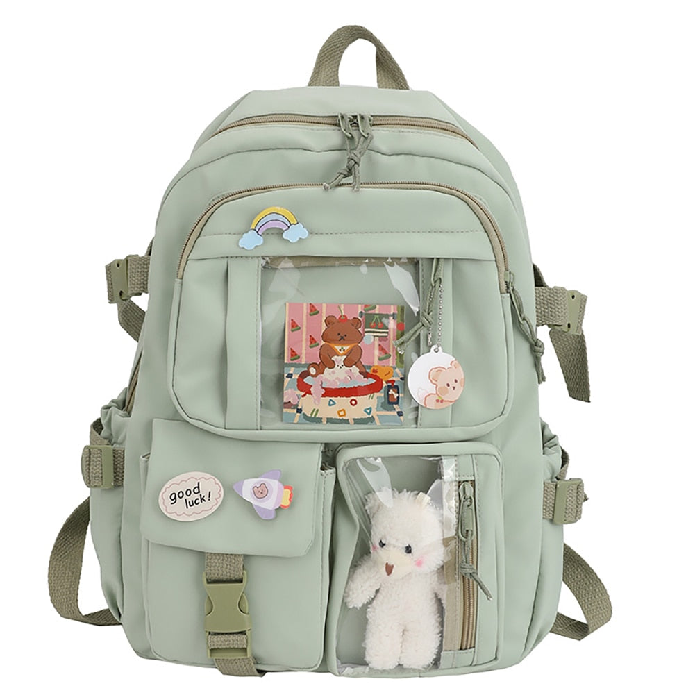 Cute waterproof nylon backpack for women with multiple pockets and soft handle, perfect for school and daily use.