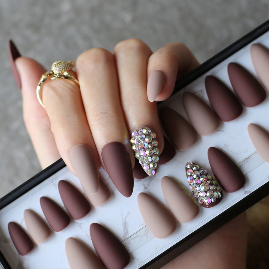 Dark coffee full stiletto press-on nails displayed in a stylish arrangement, showcasing their elegant design and color.