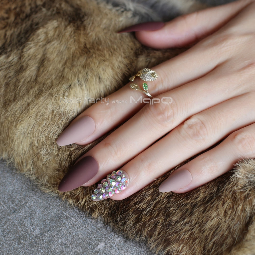 Dark coffee full stiletto press-on nails displayed in a stylish arrangement, showcasing their elegant design and color.