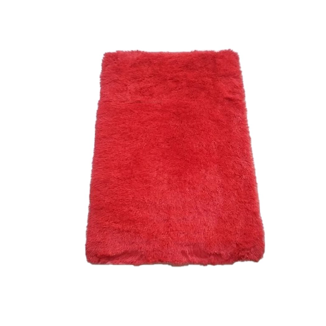 Designer Soft Shag Shaggy Floor Confetti Rug in vibrant red, showcasing its plush texture and non-slip silicone bottom.