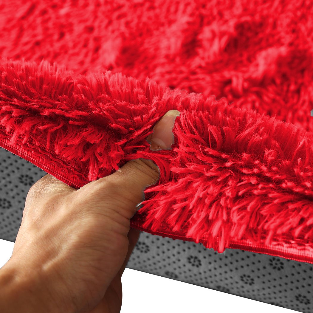 Designer Soft Shag Shaggy Floor Confetti Rug in vibrant red, showcasing its plush texture and non-slip silicone bottom.