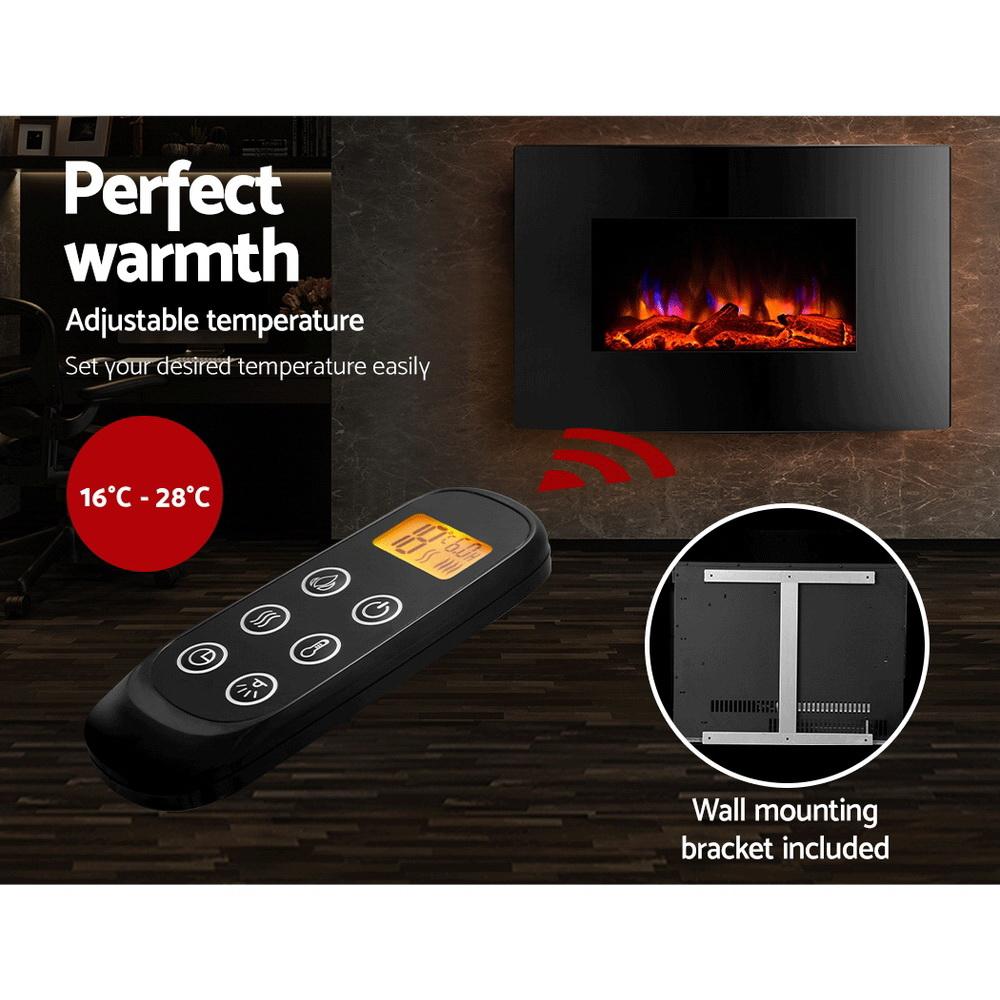 Devanti 2000W Wall Mounted Electric Fireplace featuring a curved black tempered glass front and realistic 3D flame effect.