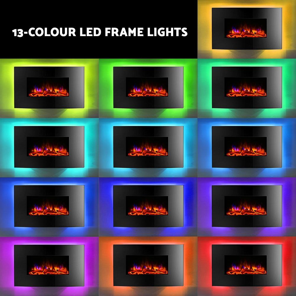 Devanti 2000W Wall Mounted Electric Fireplace featuring a curved black tempered glass front and realistic 3D flame effect.