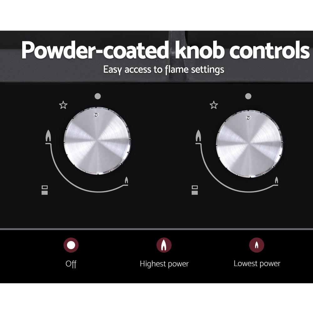 Devanti 30cm Gas Cooktop with two burners and black tempered glass surface, showcasing its sleek design and safety features.