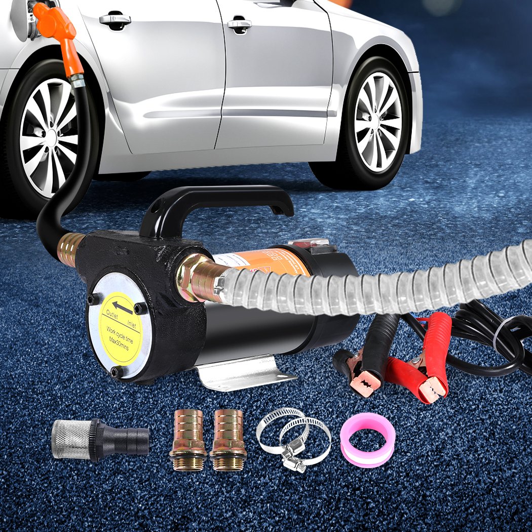 Electric diesel transfer pump with ergonomic design, featuring copper motor and alligator clips for battery connection.