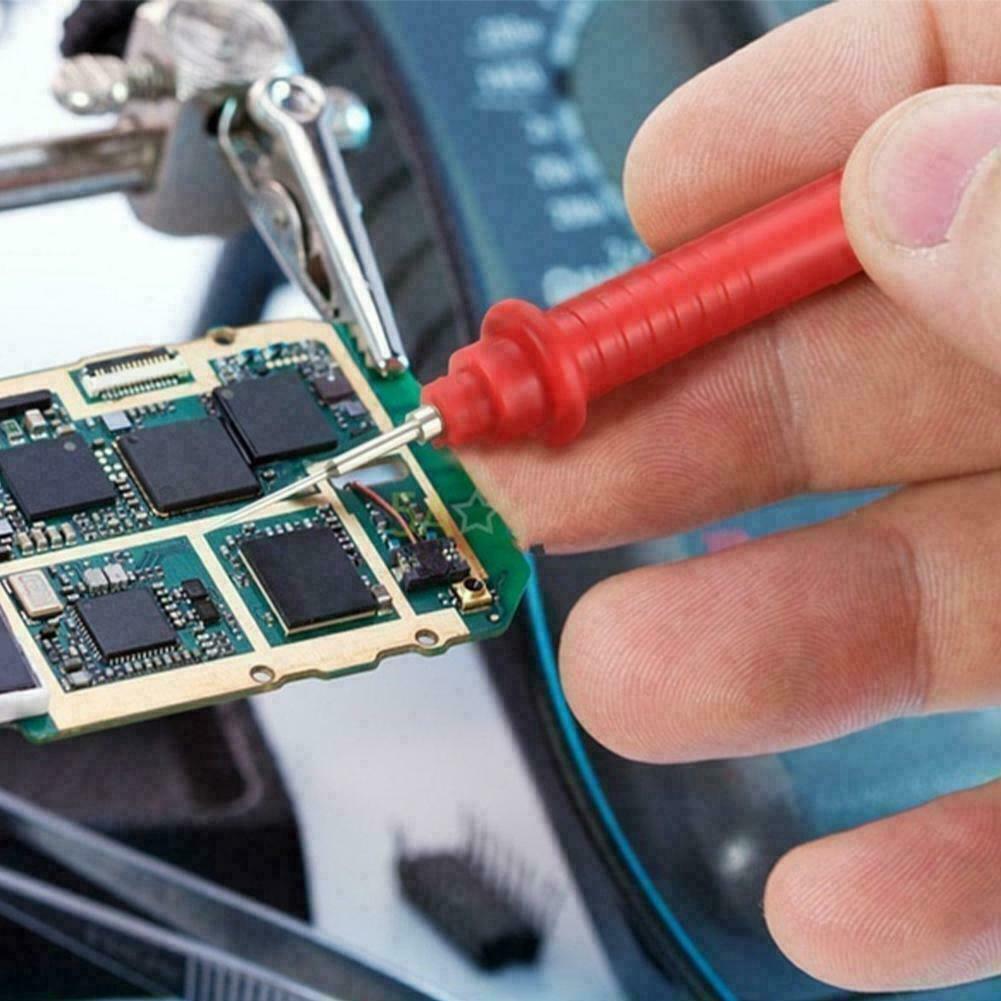 Digital Multimeter XL830L displaying various electrical measurements with probe cables attached.
