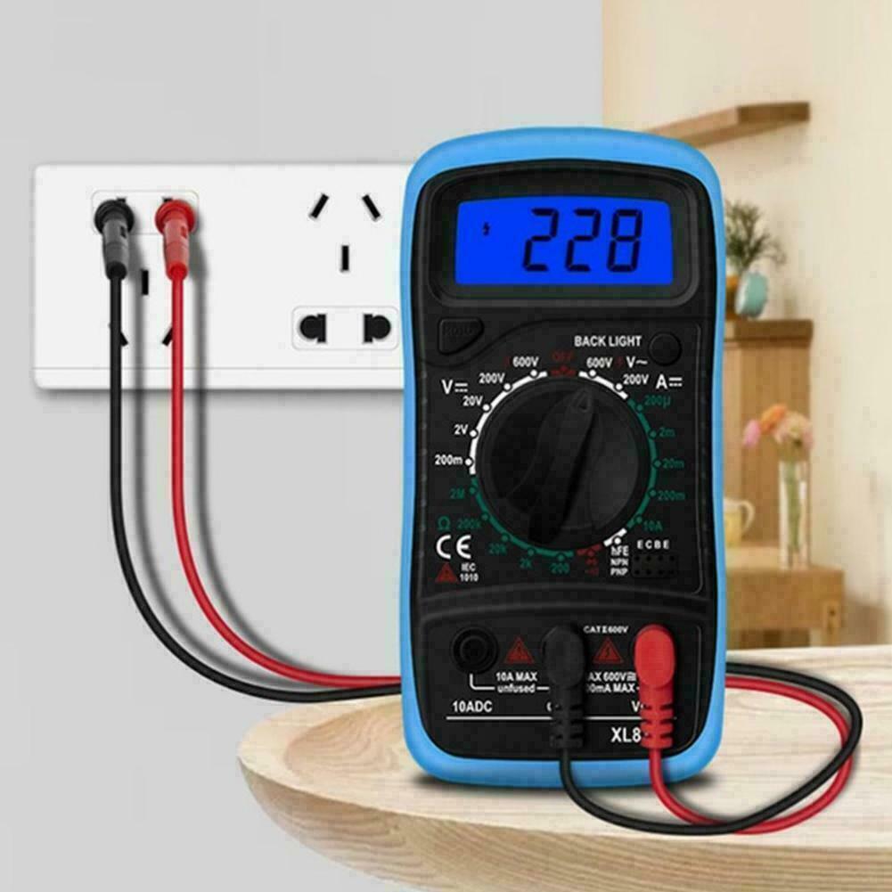 Digital Multimeter XL830L displaying various electrical measurements with probe cables attached.