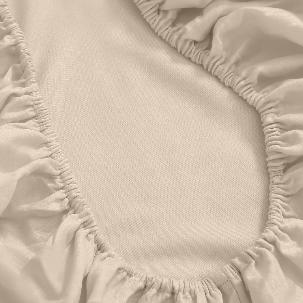 DreamZ 4 Pcs Natural Bamboo Cotton Bed Sheet Set in King Size Ivory, featuring a fitted sheet, flat sheet, and two pillowcases, showcasing a soft sateen finish.