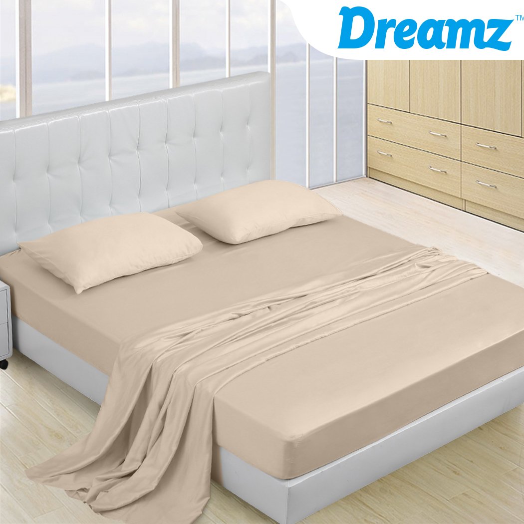 DreamZ 4 Pcs Natural Bamboo Cotton Bed Sheet Set in King Size Ivory, featuring a fitted sheet, flat sheet, and two pillowcases, showcasing a soft sateen finish.