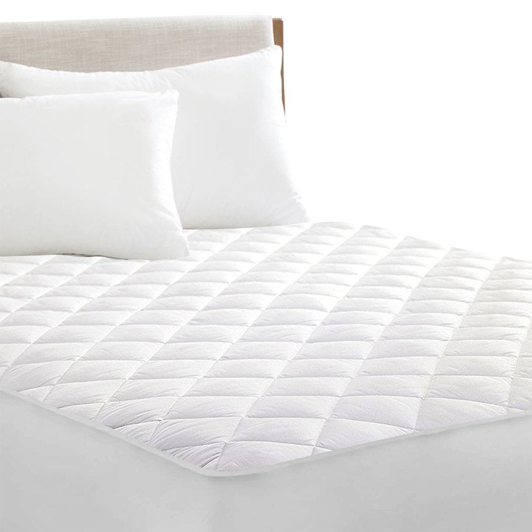 DreamZ Fully Fitted Waterproof Microfiber Mattress Protector King in white, featuring a quilted diamond pattern and elastic band edges for a secure fit.