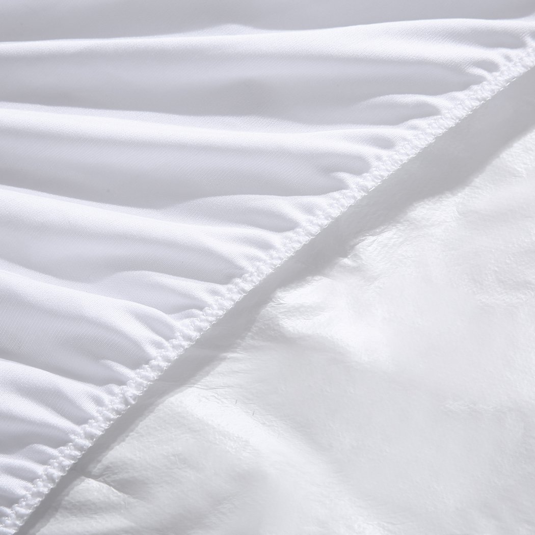 DreamZ Fully Fitted Waterproof Microfiber Mattress Protector King in white, featuring a quilted diamond pattern and elastic band edges for a secure fit.