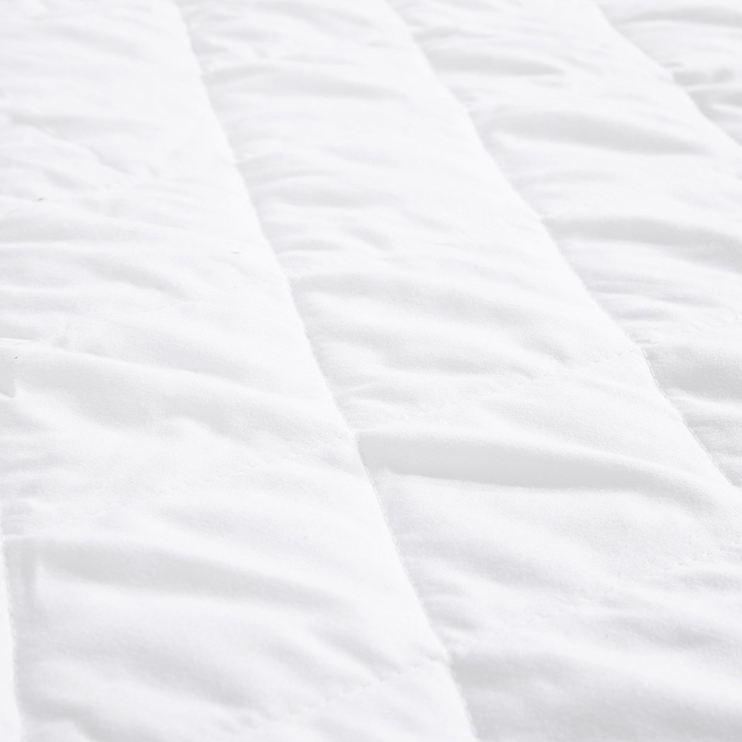 DreamZ Fully Fitted Waterproof Microfiber Mattress Protector in white with quilted diamond pattern, designed for super king mattresses.