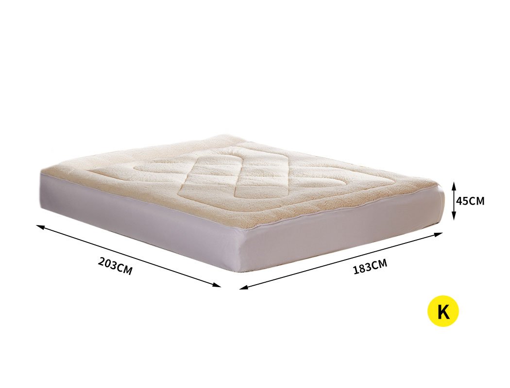 Dreamz Mattress Topper featuring 100% wool fleece and cotton, reversible design, cream and white color, with a fitted elastic skirt.