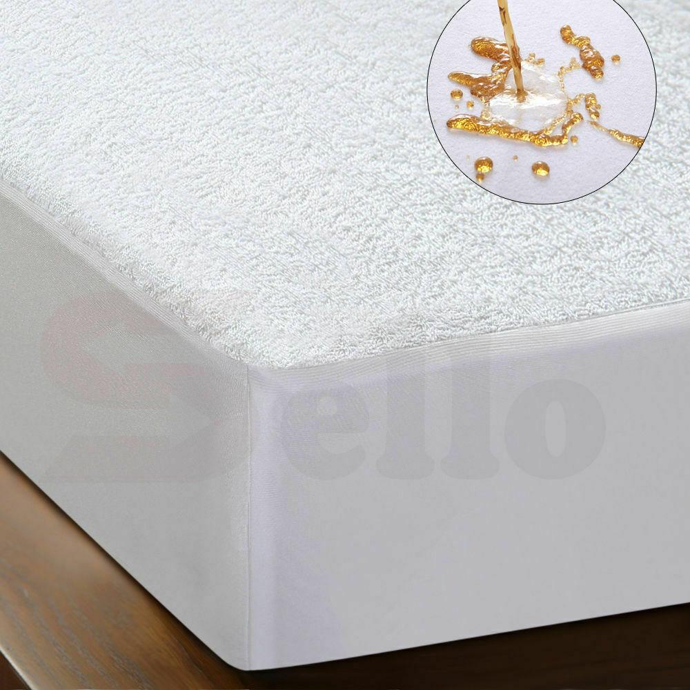 DreamZ Terry Cotton Fully Fitted Waterproof Mattress Protector, showcasing its soft terry fabric and waterproof design.