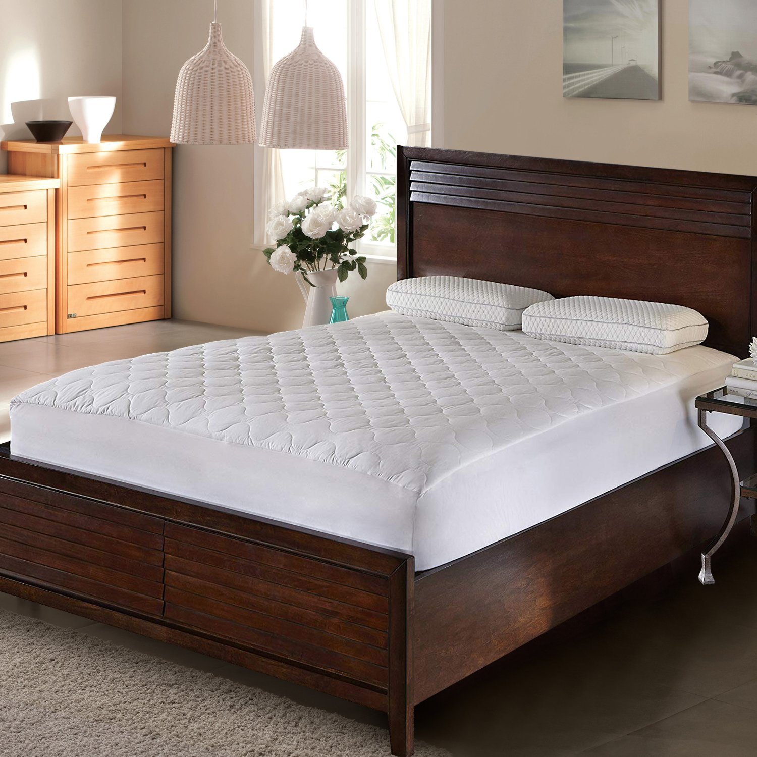 DreamZ Terry Cotton Fully Fitted Waterproof Mattress Protector, showcasing its soft terry fabric and waterproof design.