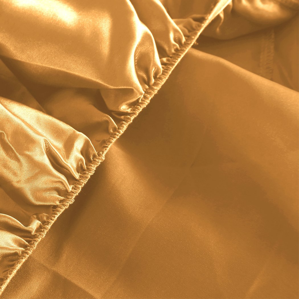 Golden satin fitted sheet fabric.