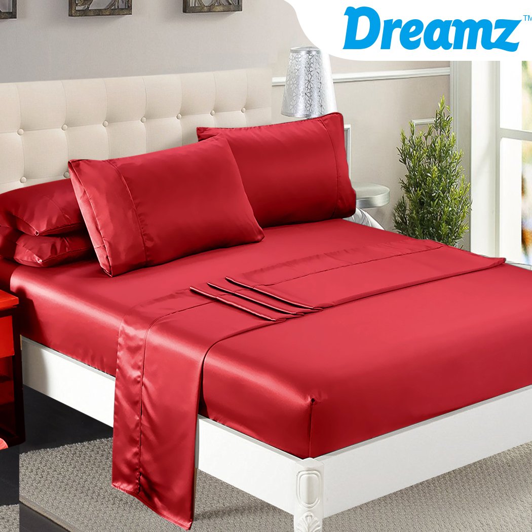 DreamZ Ultra Soft Silky Satin Bed Sheet Set in Burgundy, featuring a fitted sheet, flat sheet, and pillowcase, showcasing its luxurious sheen and smooth texture.