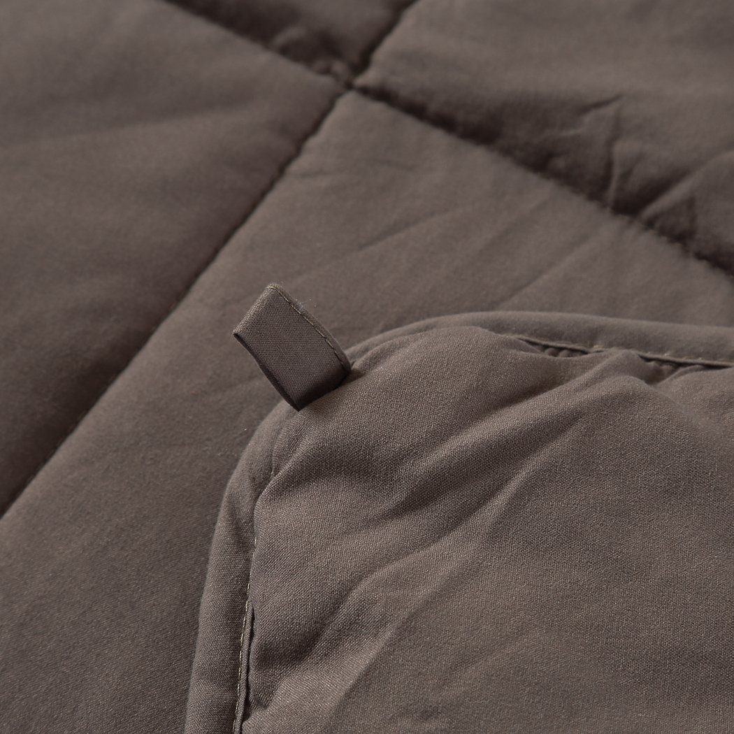 DreamZ Weighted Blanket in mink color, featuring a soft polyester exterior and glass bead filling for deep relaxation.